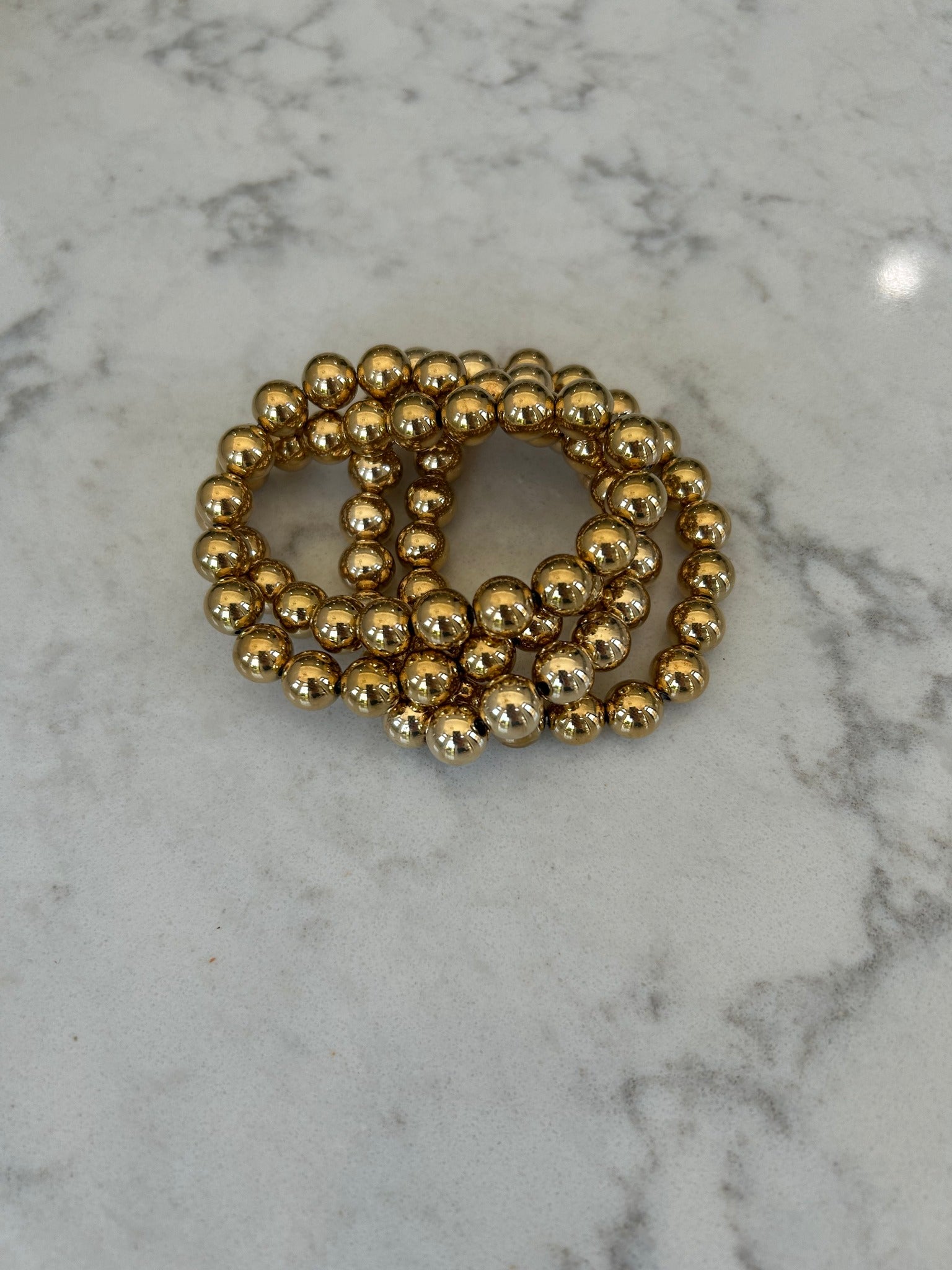 4pcs. Gold Beaded Bracelets